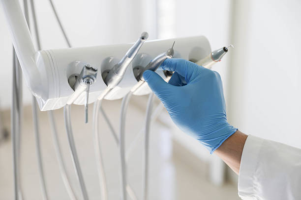 Professional Tooth Extraction technician working in Calhoun County County, AL